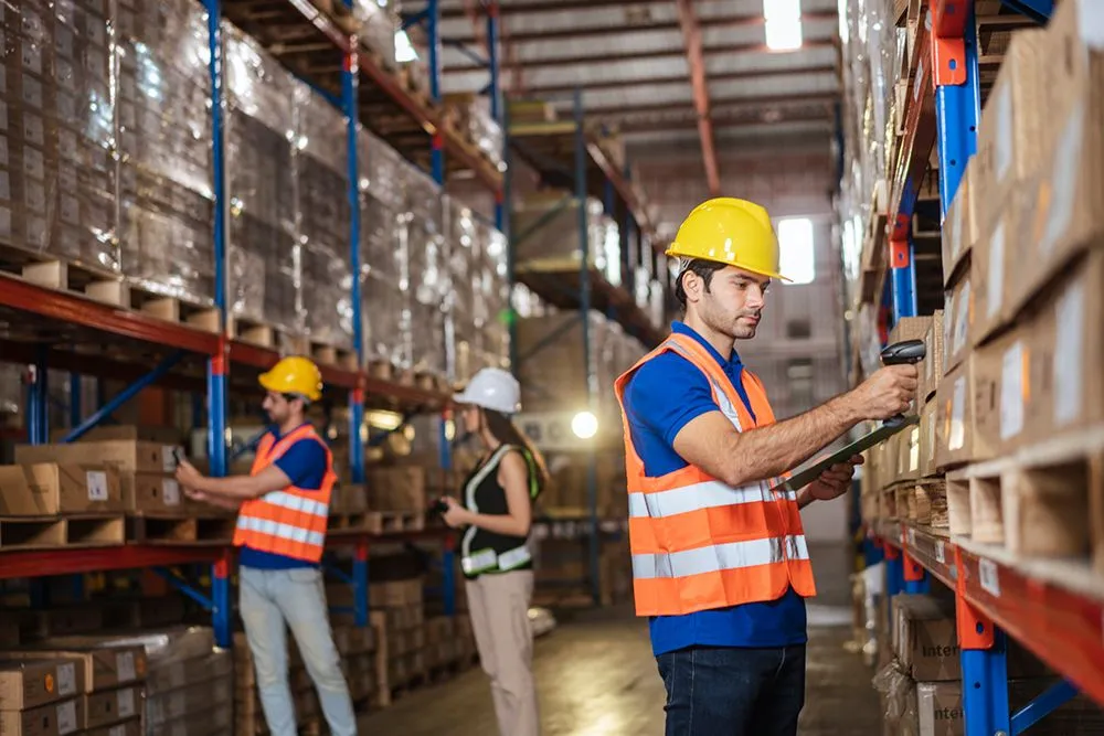 Efficient unloading of freight containers by Kann Enterprises logistics team